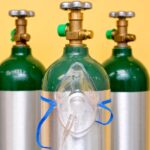 What specific features make medical oxygen cylinders essential in emergency medical services?